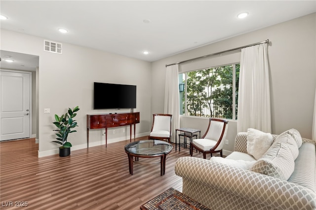 living room with hardwood / wood-style flooring