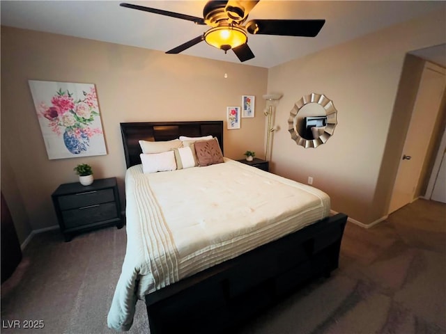 bedroom with a ceiling fan, carpet, and baseboards