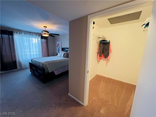 bedroom featuring baseboards, a ceiling fan, and carpet flooring