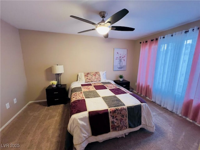 bedroom with baseboards, multiple windows, and carpet