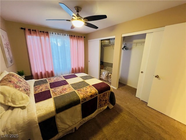 bedroom featuring multiple closets, carpet floors, and ceiling fan