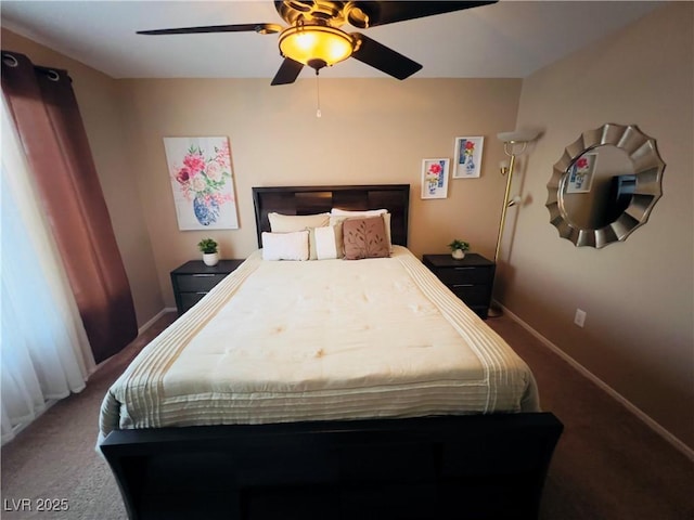 carpeted bedroom with baseboards and a ceiling fan