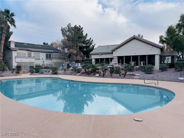 pool featuring fence