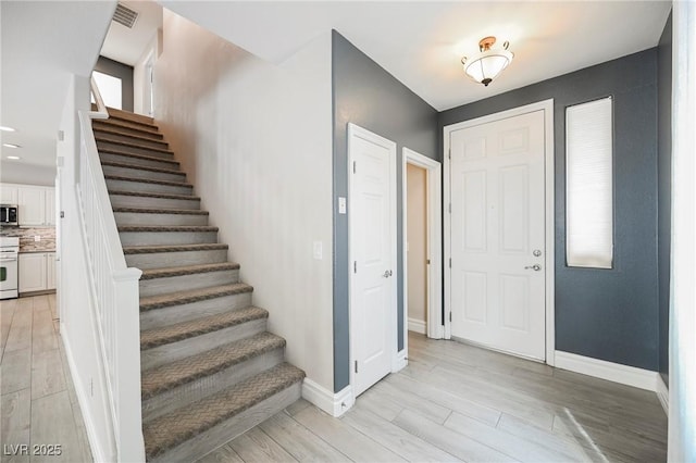 foyer featuring light hardwood / wood-style flooring