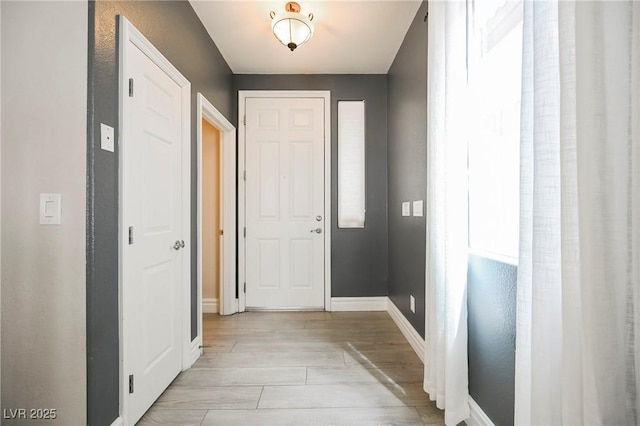 entryway with light hardwood / wood-style floors