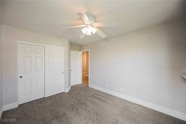 unfurnished bedroom featuring carpet, ceiling fan, and a closet