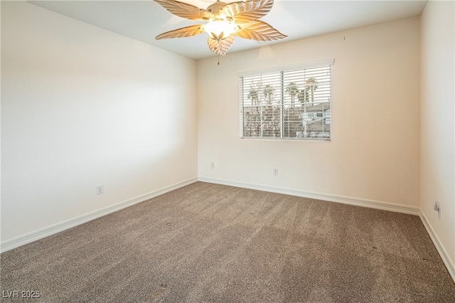 spare room featuring ceiling fan and carpet floors