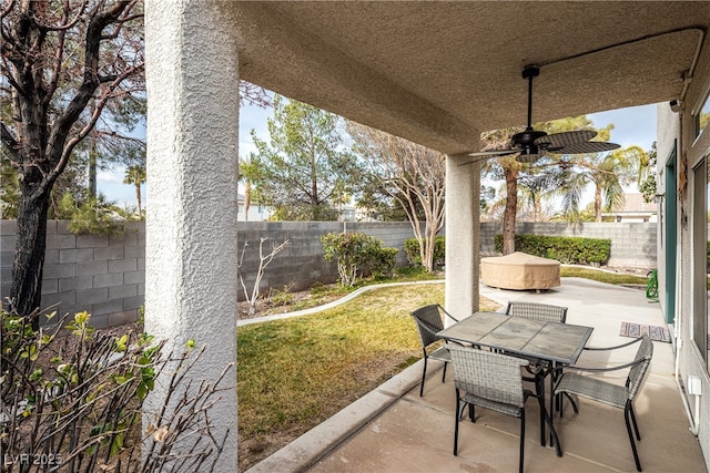 view of patio / terrace featuring ceiling fan