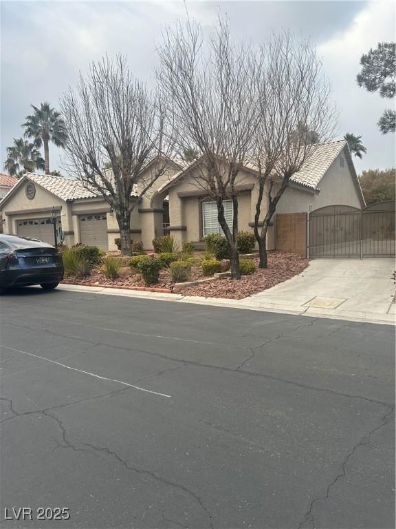 view of front of property with a garage