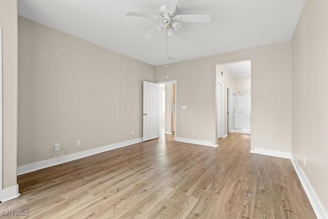 unfurnished bedroom with ceiling fan, baseboards, and wood finished floors