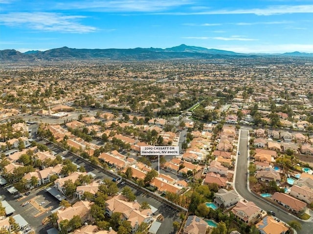 aerial view with a mountain view and a residential view