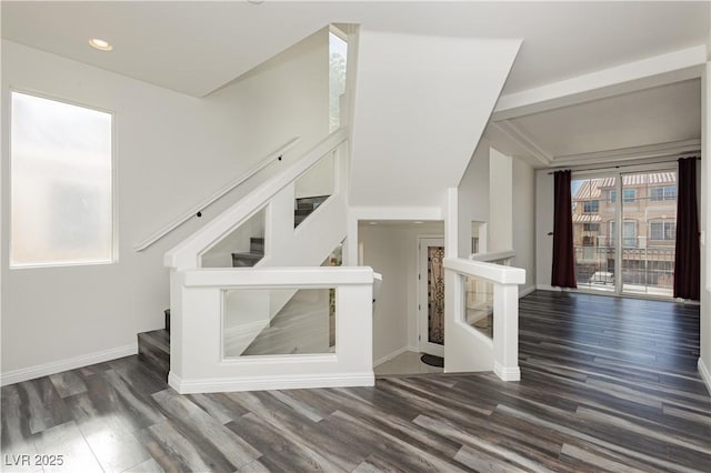 unfurnished living room with dark wood-type flooring