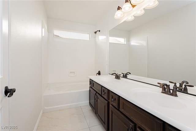 bathroom with vanity and washtub / shower combination