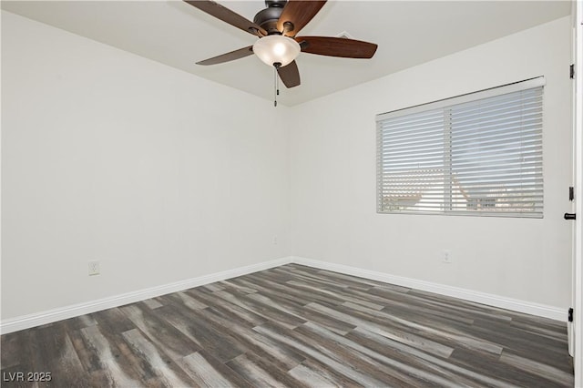 empty room featuring dark hardwood / wood-style floors and ceiling fan