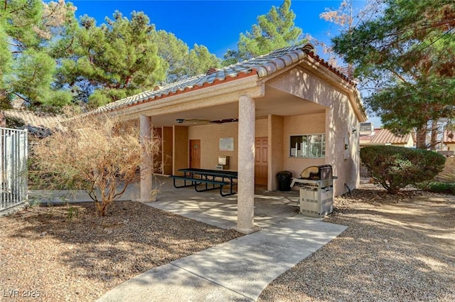 view of patio / terrace with a ceiling fan