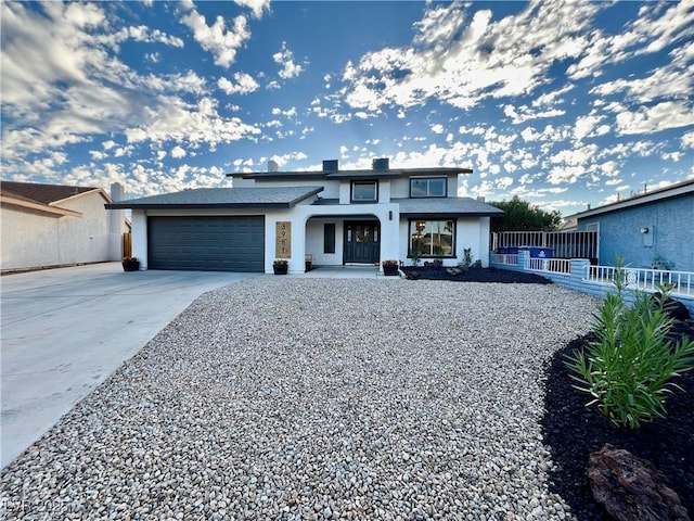 view of front of property with a garage