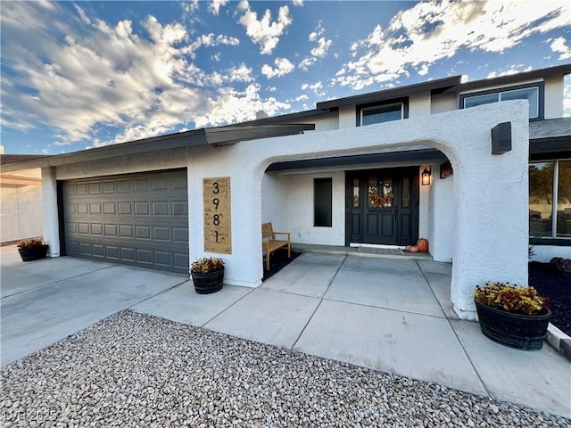 single story home featuring a garage