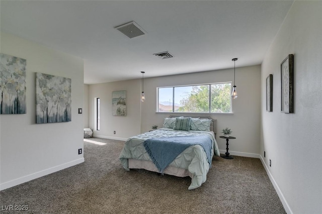 bedroom with dark carpet