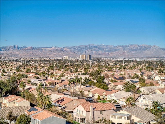 bird's eye view with a mountain view