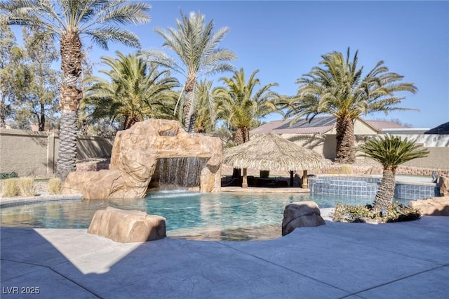 view of pool with a gazebo and pool water feature