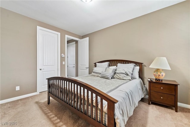 bedroom featuring light colored carpet