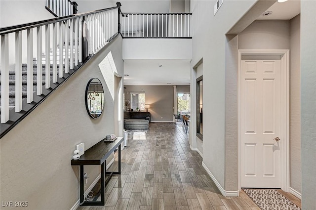 entryway with a high ceiling