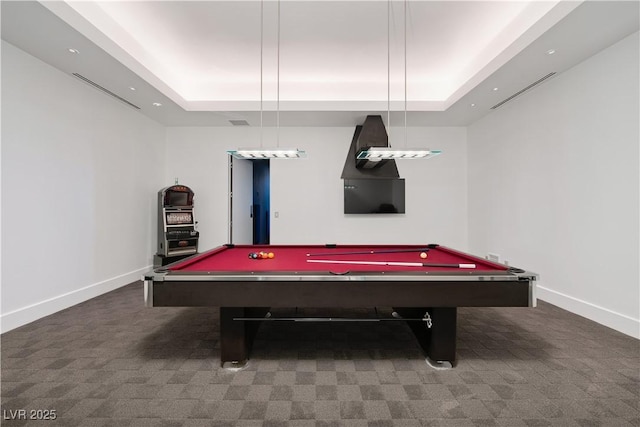 game room with dark carpet, a tray ceiling, and pool table