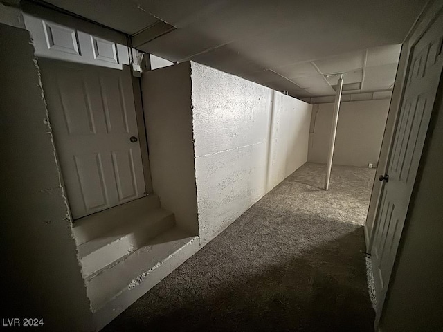 basement with light carpet