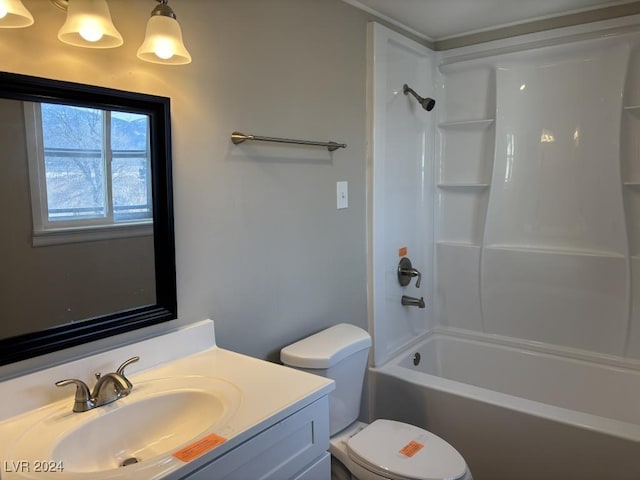 full bathroom with vanity, bathtub / shower combination, and toilet