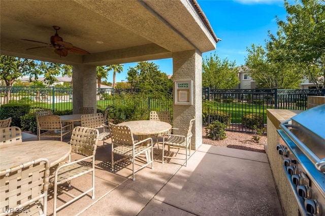 view of patio / terrace featuring ceiling fan