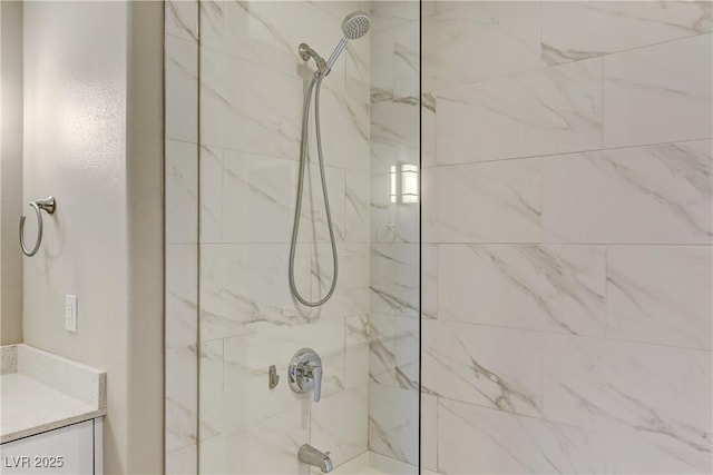 bathroom featuring vanity and tiled shower / bath combo