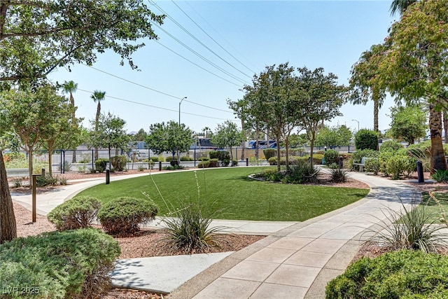 view of home's community featuring a yard