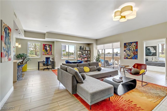 living room with plenty of natural light