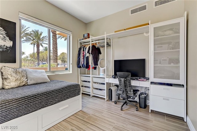 bedroom featuring light hardwood / wood-style flooring