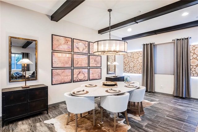 dining area with an inviting chandelier and beam ceiling