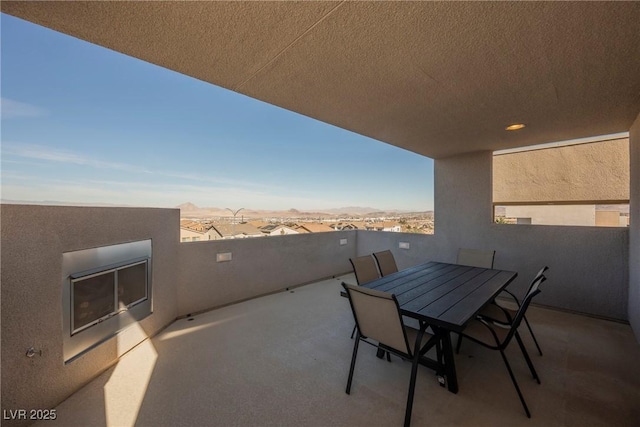 balcony featuring a mountain view