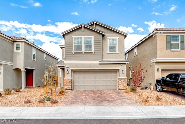 view of front of home with a garage