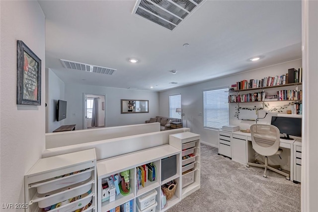 office area with light colored carpet