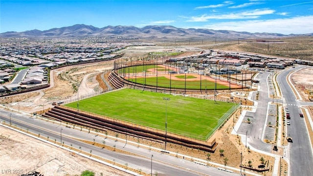 birds eye view of property featuring a mountain view