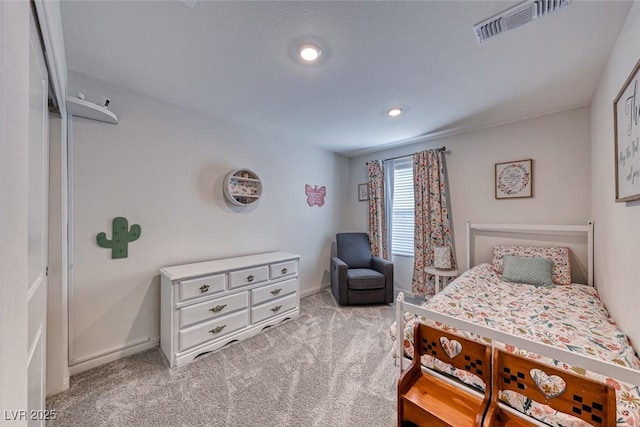 bedroom featuring light colored carpet