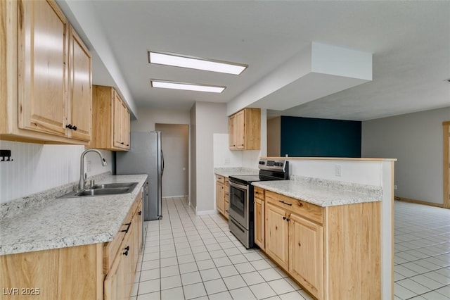 kitchen featuring light brown cabinetry, sink, stainless steel range with electric cooktop, light tile patterned floors, and kitchen peninsula