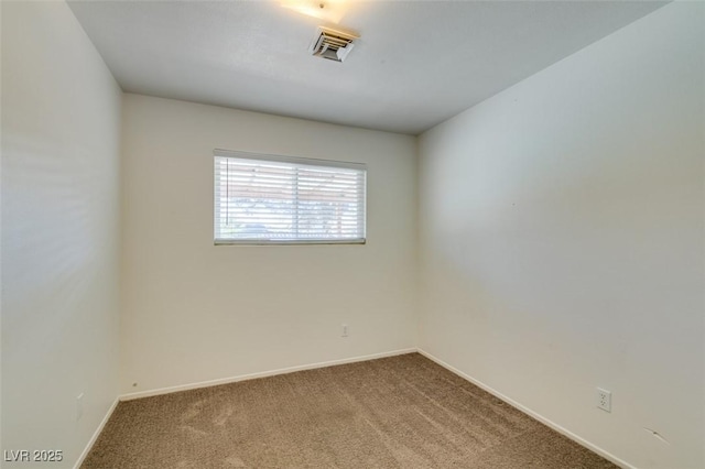 empty room featuring carpet floors