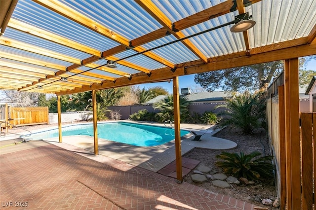 view of pool featuring a pergola and a patio area