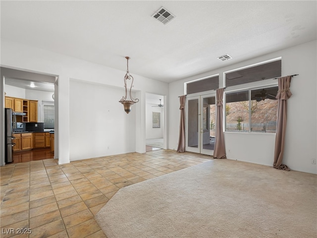 spare room with ceiling fan