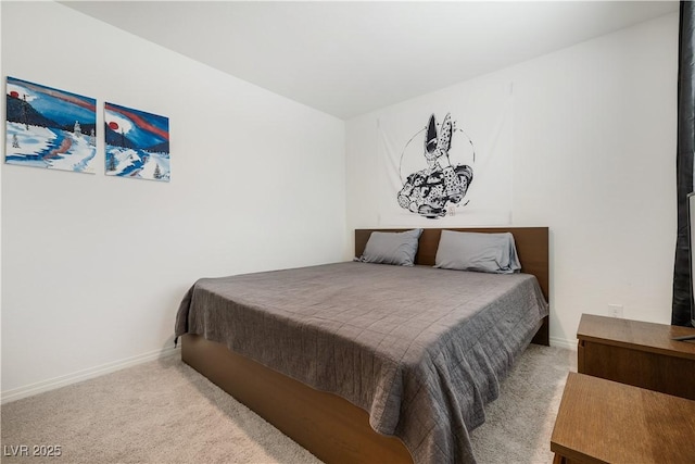 bedroom featuring light carpet