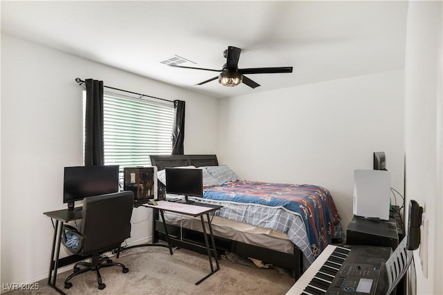 carpeted bedroom featuring ceiling fan