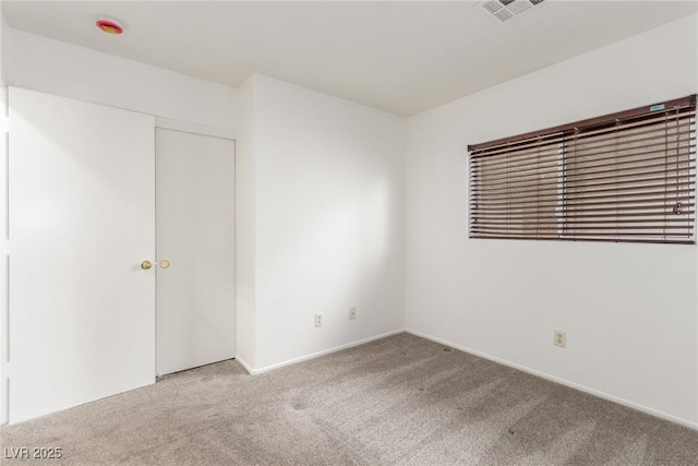 unfurnished bedroom with carpet floors