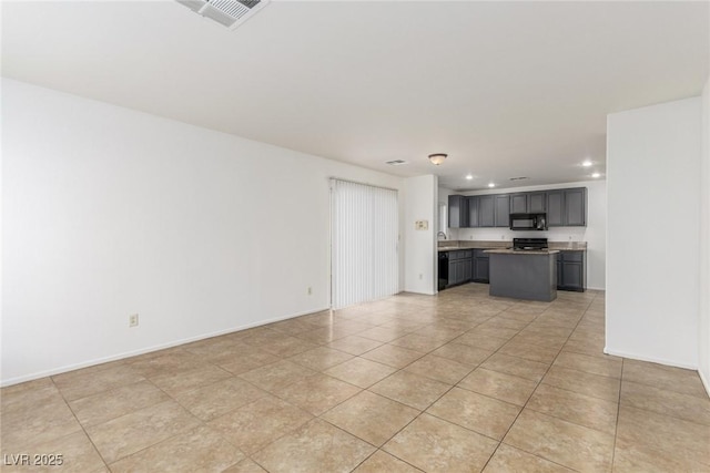 unfurnished living room featuring light tile patterned floors