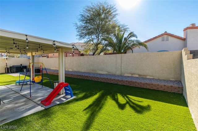 view of yard featuring a playground