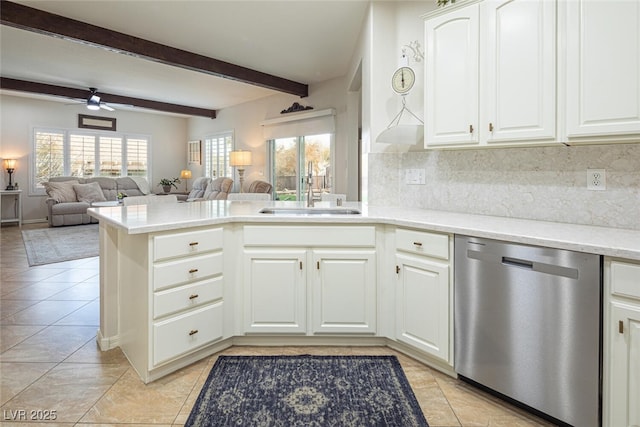 kitchen with white cabinetry, sink, plenty of natural light, and dishwasher